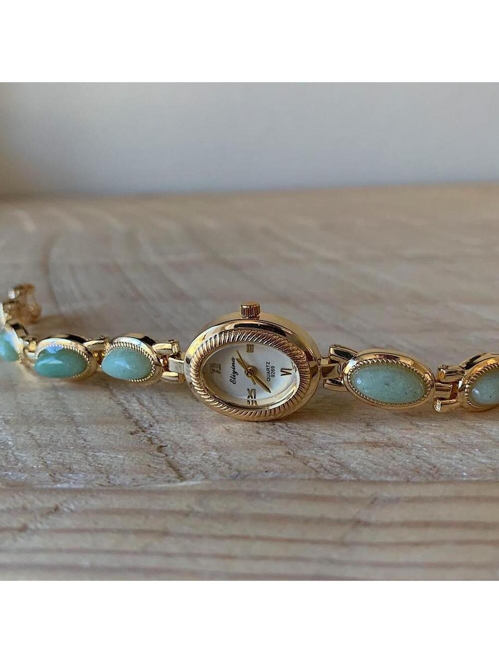 Dainty Gold watch with light blue jade stone opal accents. Item works tell time - Picture 5 of 8